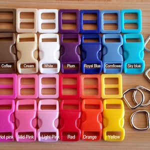 May include: Assortment of 18 plastic side release buckles in various colors, including black, grey, coffee, cream, white, plum, royal blue, cornflower, sky blue, lime, turquoise, hot pink, mid pink, light pink, red, orange, and yellow. Also included are 20 silver D-rings.