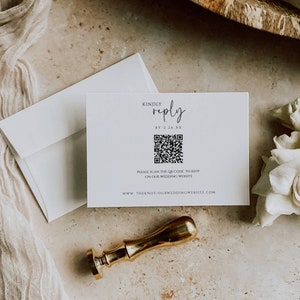 May include: A white RSVP card with a black QR code and the text "Kindly reply by 2.26.XX. Please scan the QR code to RSVP on our wedding website. www.theknot/ourweddingwebsite.com"