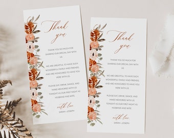 May include: Two thank you cards featuring floral designs in shades of orange, pink, and green. The text on the cards reads "Thank you" and includes a message thanking guests for sharing their special day. The cards are signed "with love, Sarah & Joseph."