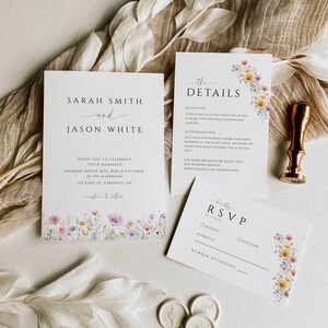 May include: Wedding invitation suite featuring a floral design. The invitation card displays the names "Sarah Smith" and "Jason White" with a floral border. The details card provides information about the reception and accommodation. The RSVP card has a floral design and includes a section for guests to accept or decline the invitation.