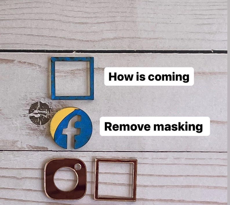 May include: Wooden social media icons, including a blue square, a Facebook logo, and an Instagram logo, are displayed on a light wood grain surface. The text "How is coming" and "Remove masking" are also present.