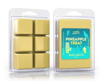 May include: A clear plastic container with six wax melts in a light yellow color. The container has a label that says "PARK SCENTS PINEAPPLE TREAT WAX MELTS 2.75oz".