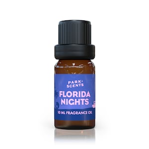 May include: A 10 ml brown glass bottle of fragrance oil with a black cap. The label is blue with white text that reads "Park Scents Florida Nights".