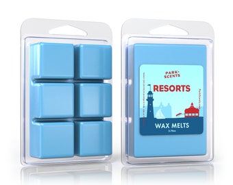 May include: Two clear plastic clamshell packages of blue wax melts. One package shows six individual cubes, the other shows the wax melt in a solid form with a label that reads "Resorts" and "Wax Melts".
