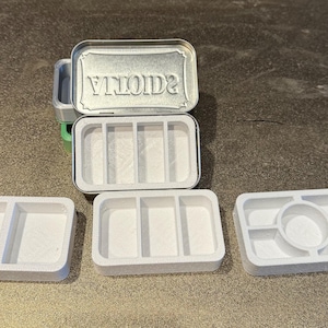 Altoid tin liner, pill divider, pill organizer, sewing kit, small part holder.