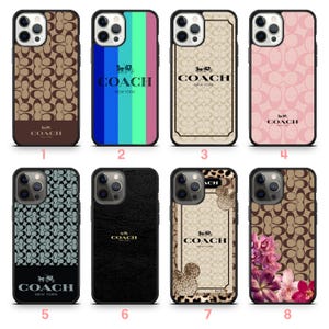 May include: Collection of eight phone cases with various designs. Includes cases with the Coach logo, a brown pattern, a striped design, a pink pattern, a black and white pattern, a black textured case, and a floral design.