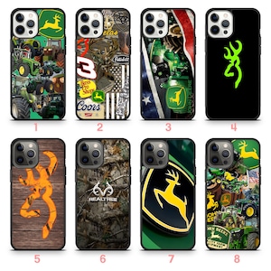May include: Collection of phone cases with various designs. Includes cases with John Deere tractors, a Browning logo on wood, Realtree camouflage, and a Coors logo. The cases are black with colorful graphics.