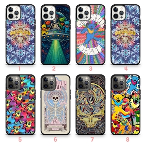 May include: A collection of eight phone cases featuring Grateful Dead-themed designs. The cases showcase vibrant colors and graphics, including dancing bears, skeletons, and psychedelic patterns. Each case has a black border and is designed for a smartphone.
