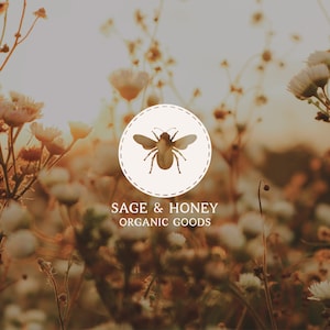 May include: A logo for "Sage & Honey Organic Goods" featuring a bee illustration inside a circular design. The logo is set against a blurred background of wildflowers in a field, with the text "Sage & Honey Organic Goods" below.