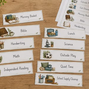 May include: A collection of rectangular white labels featuring watercolor illustrations and text for school subjects including Morning Basket, Bible, Handwriting, Math, Independent Reading, Lunch, Science, Outside Play, Quiet Time, and School Supply Cleanup.