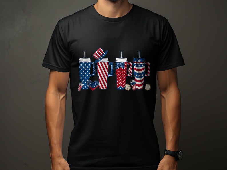 Four festive cups with patriotic patterns and straws on a black t-shirt.