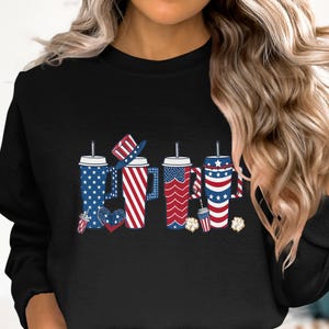 Four drinks with patriotic patterns and small decorative hats.