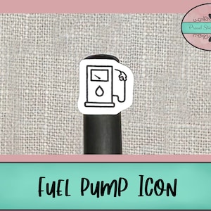 May include: A black and white sticker of a fuel pump icon. The sticker is on a black pen.