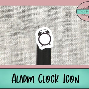 May include: Black and white alarm clock icon sticker on a gray textured background. The sticker is on a black surface.  "ALARM CLOCK ICON" is written in black text on a teal background.