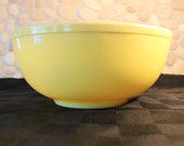 Vintage, Primary colors, Pyrex, yellow nesting bowl. 1st edition line, Not numbered.
