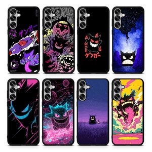May include: A collection of eight black phone cases featuring various colorful graphic designs. The designs include cartoon characters, Japanese text, and abstract art. The cases are for a Samsung Galaxy phone.
