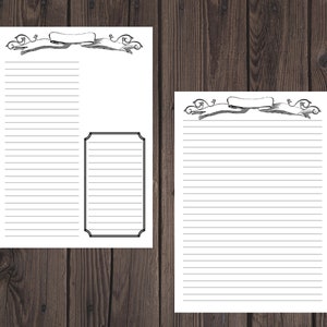 Puede incluir: Dos hojas de papel blanco rayado con ilustraciones de pancartas decorativas. Una hoja tiene un marco rectangular. Las hojas est&aacute;n sobre una superficie de madera oscura. El papel est&aacute; en blanco y listo para escribir.