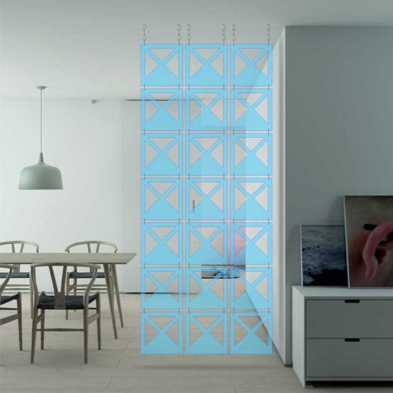 May include: A light blue room divider made of interlocking panels with a geometric design. The divider is hanging from the ceiling and is made of thin, lightweight material.