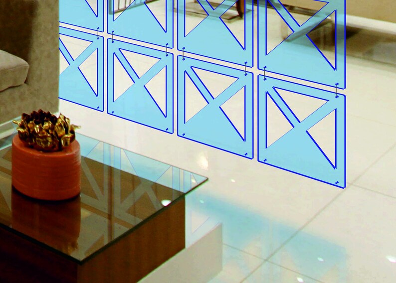 May include: A blue geometric room divider made of acrylic panels with a criss-cross pattern. The divider is hanging from the ceiling and is in front of a glass coffee table.