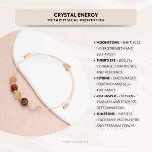 May include: A bracelet with a selection of gemstones in various colours, including moonstone, tiger's eye, citrine, and red jasper. The text reads "Crystal Energy, Metaphysical Properties" and lists the properties of each stone.