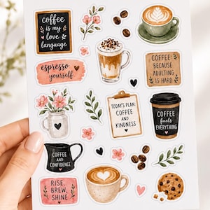 Può includere: Un foglio di adesivi intitolato ESPRESSO YOURSELF con varie illustrazioni a tema caffè, tra cui tazze con latte art, una tazza di caffè nera, un biscotto con gocce di cioccolato, chicchi di caffè, rametti floreali e cartelli con testi come COFFEE IS MY LOVE LANGUAGE e COFFEE FUELS EVERYTHING.