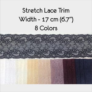 May include: Black stretch lace trim with a floral pattern. The trim is 6.7 inches wide and comes in 8 colors. The colors are shown in the image.