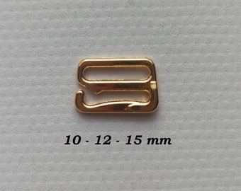 May include: Gold metal slider buckle with three loops. The buckle measures 10 - 12 - 15 mm.