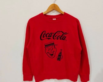 sudadera coca cola