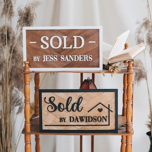 Realtor sold by sign, real estate sign, sold by real estate sign