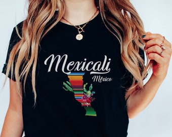 May include: Black t-shirt with a white graphic of the state of Baja California, Mexico, with the text "Mexicali, Mexico".