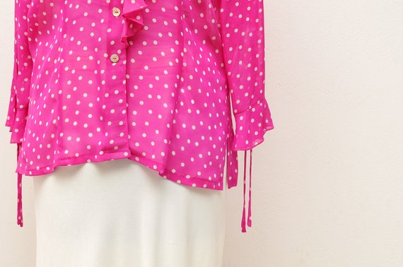 pink spotty blouse