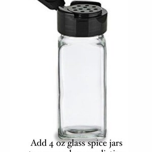 May include: Four clear glass spice jars with black shaker lids. Each jar is 4 ounces.