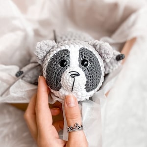 PDF crochet pattern for a cute raccoon made of plush wool