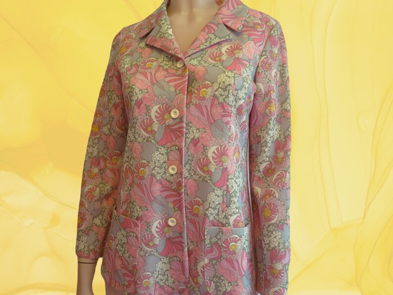 Colorful 70s vintage woman\u2019s jacket with floral print hippie style