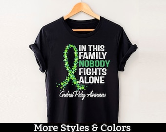 Zhirnlähmung DP Awareness Shirt, In dieser Familie kämpft niemand alleine, Zhirnlähmung Geschenk, Zhirnlähmung Unterstützung, DP Pflege-T-Shirts