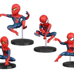 May include: Set of four red and blue Spider-Man action figures in different poses. Each figure is approximately 4 inches tall and comes with a black base.
