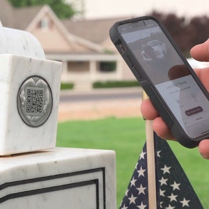 Place or Embed our Challenge Coin into the headstone, then scan to learn more and add memories of your loved ones