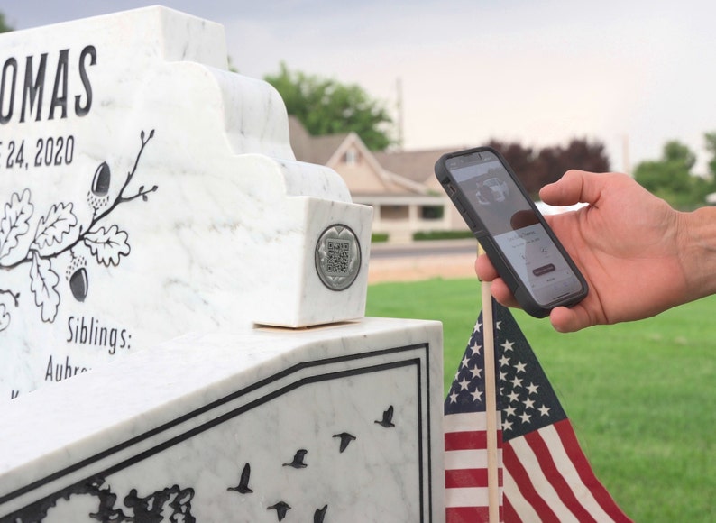 Place or Embed our Challenge Coin into the headstone, then scan to learn more and add memories of your loved ones