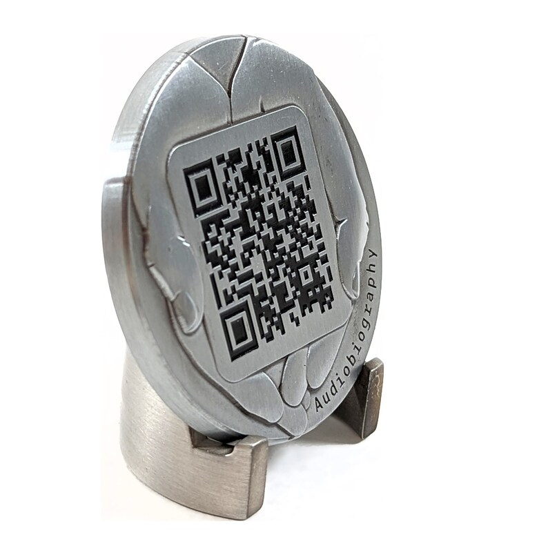 Our coin is 2" round and 1/8" thick, matching the standard for challenge coins. This makes is easy for monument shops to embed the coin into the headstone.