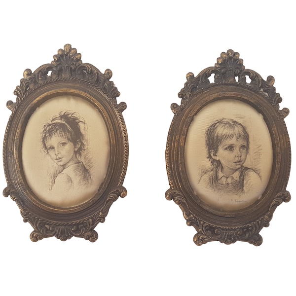 Pair of vintage small wall paintings in oval frames. Vintage portrait in charcoal. Made in Italy.