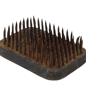 Vintage small oblong metal flower frog. Flower stand with spikes. Ikebana. Made in Japan.
