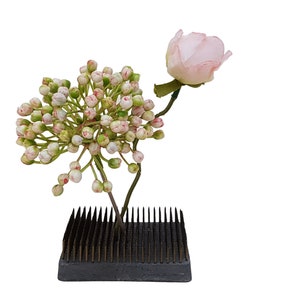Vintage rectangular metal flower frog. Flower stand with spikes. Retro arranger.
