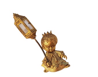 applique murale vintage en bronze. Figurine princesse avec une lampe de poche. Veilleuse pour la chambre des enfants.