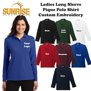 May include: A woman wearing a blue long-sleeve pique polo shirt with a custom logo. The image displays various colors of the shirt, including black, dark green, white, red, burgundy, royal blue, and navy. The text reads "Ladies Long Sleeve Pique Polo Shirt Custom Embroidery."