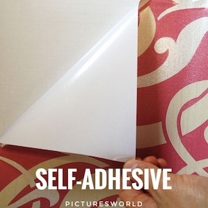 May include: A close-up of a white self-adhesive wallpaper roll with a red and gold patterned design. The adhesive backing is visible as a corner of the roll is peeled back. The text "SELF-ADHESIVE" and "PICTURESWORLD" is visible on the roll.
