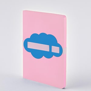 May include: A pink notebook featuring a blue cloud design and two white rectangles. A light pink elastic band secures the notebook. The notebook is positioned upright against a white backdrop.
