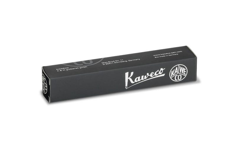May include: A black rectangular box with the Kaweco logo and text. The box is made in Germany and has the address Max-Brau-Str. 11, D 90471 N&uuml;rnberg, Germany. The box is on a white background.