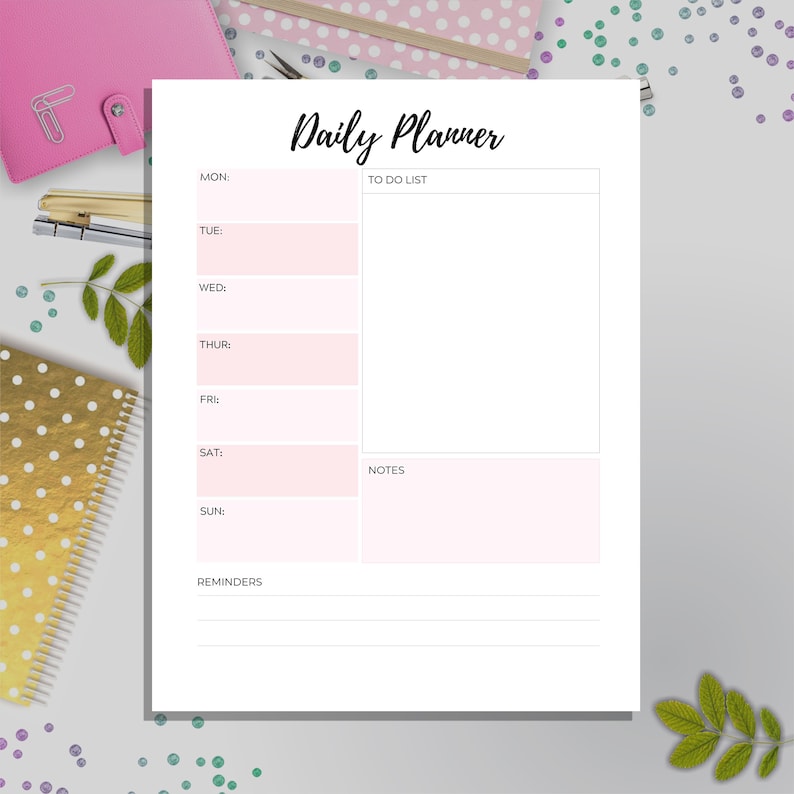 May include: A white printable daily planner with a pink background for the days of the week. The planner has sections for a to-do list, notes, and reminders.