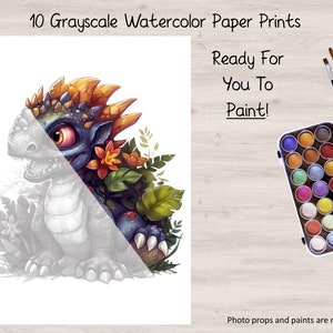 May include: Ten grayscale watercolor paper prints featuring a cartoon dragon with a spiky orange crest and surrounded by flowers and leaves. The text "Ready For You To Paint!" is written in black text on a white background.