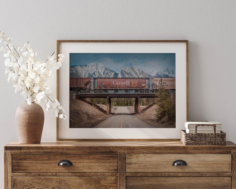 a picture of a train going over a bridge